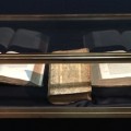 interactive display case, ancient book
